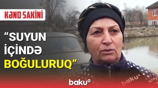 Yağış sularından gölməçəyə çevrilən kənd