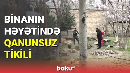 Abşeronda binanın həyətində qanunsuz tikili
