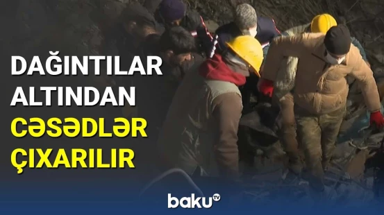 Dağıntılar altından cəsədlər çıxarılır