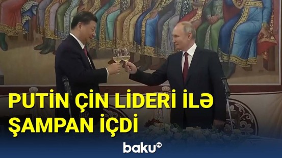 Putin nahar süfrəsində Çin lideri ilə şampan içdi