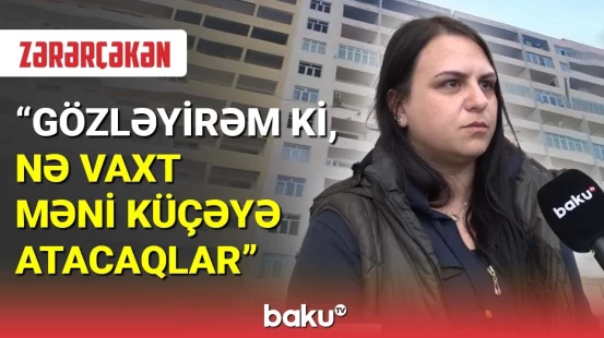 Bir binanın iki sahibi, evsiz qalan sakinlər