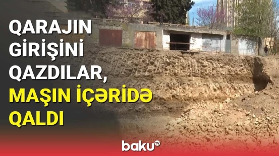 Qarajın girişini qazdılar, maşın içəridə qaldı