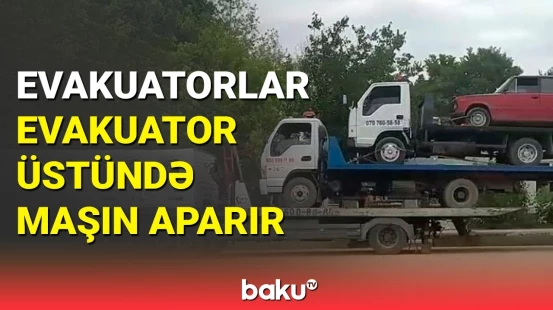 Riskli təxliyə: avtomobil hər an aşa bilər