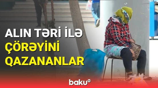 Qızmar günəş altında çalışan sakinlər