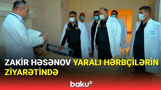 Müdafiə naziri yaralı hərbçilərimizə baş çəkdi