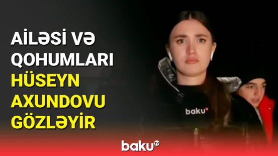 Baku TV azad edilən Hüseyn Axundovun evinin önündə