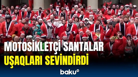 Santa kostyumları geyinmiş motosiklet sürücülərinin paradı