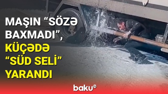 Yüzlərlə litr süd yola dağıldı | Rayon sakininin boşa çıxan cəhdləri