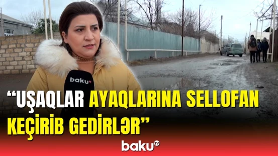 Mingəçevirdə palçığın dizə çatdığı yol | Yola baxanda xəcalət çəkirik