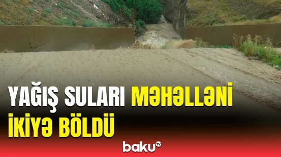 Kanalı ləğv etdilər, ona görə belə axın olur | Gəncədə yeni məhəllə su altında qaldı