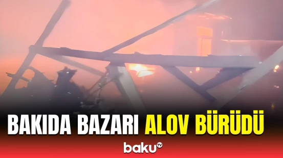Nizami rayonunda “Yeni təkər bazarı”nda yanğın | FHN hadisə yerində
