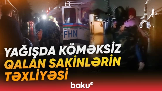 Yağışda köməksiz qalan sakinlər təxliyə edilib