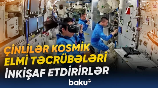 Astronavtlar robot köməkçi ilə əməkdaşlıq edirlər