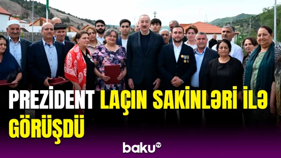 İlham Əliyev Laçının Bəylik kənd sakinlərinə evlərinin açarlarını təqdim etdi