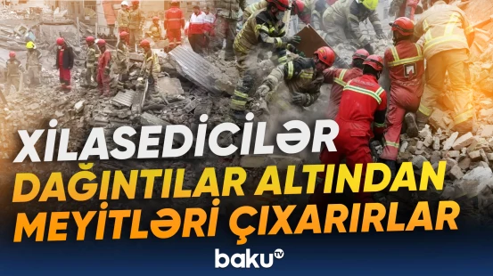 İranda xilasedicilər dağıntılar altından meyitləri çıxarırlar