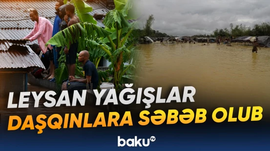 Sakinlər evlərin damlarına çıxaraq təhlükəsiz yerə sığınıblar
