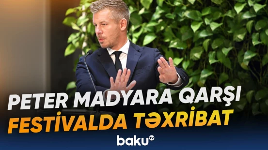 Festival zamanı Macarıstanın Baş nazirinin üzünə içki atılıb