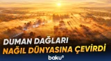 Duman və buludlar dağlıq ərazilərdə qeyri-adi mənzərə formalaşdırıb