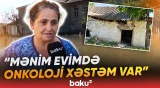 "Uşaqlarım qonşunun evindədir" | Həyətləri su altında qalan sakinlər çıxış yolu axtarırlar - Baku TV