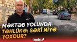 Yeni Ramanada şagirdlərin təhlükəli yolu | Səkisi olmayan yolda müxbirimizin çətin anları - Baku TV