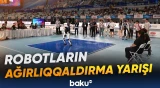 Humanoid hakimlər masasının üzərinə yıxılıb