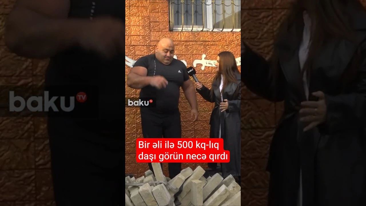 Bir əli ilə 500 kq-lıq daşı görün necə qırdı - Baku TV