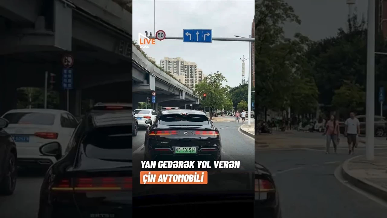 Yan gedərək yol verən Çin avtomobili - Baku TV